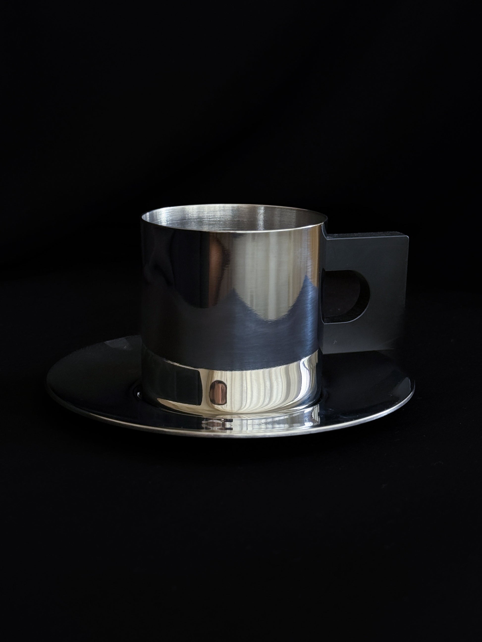 Metal Cup & Saucer, Polished Stainless Steel / Bakelite Louise Roe