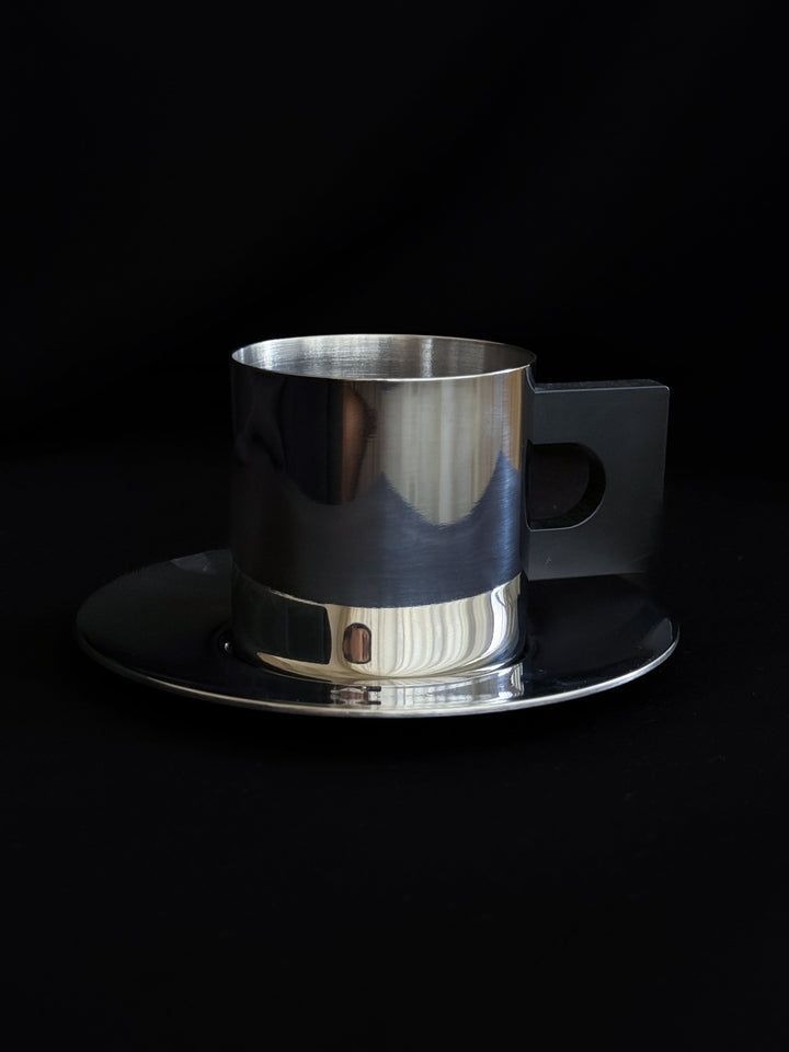 Metal Cup & Saucer, Polished Stainless Steel / Bakelite Louise Roe